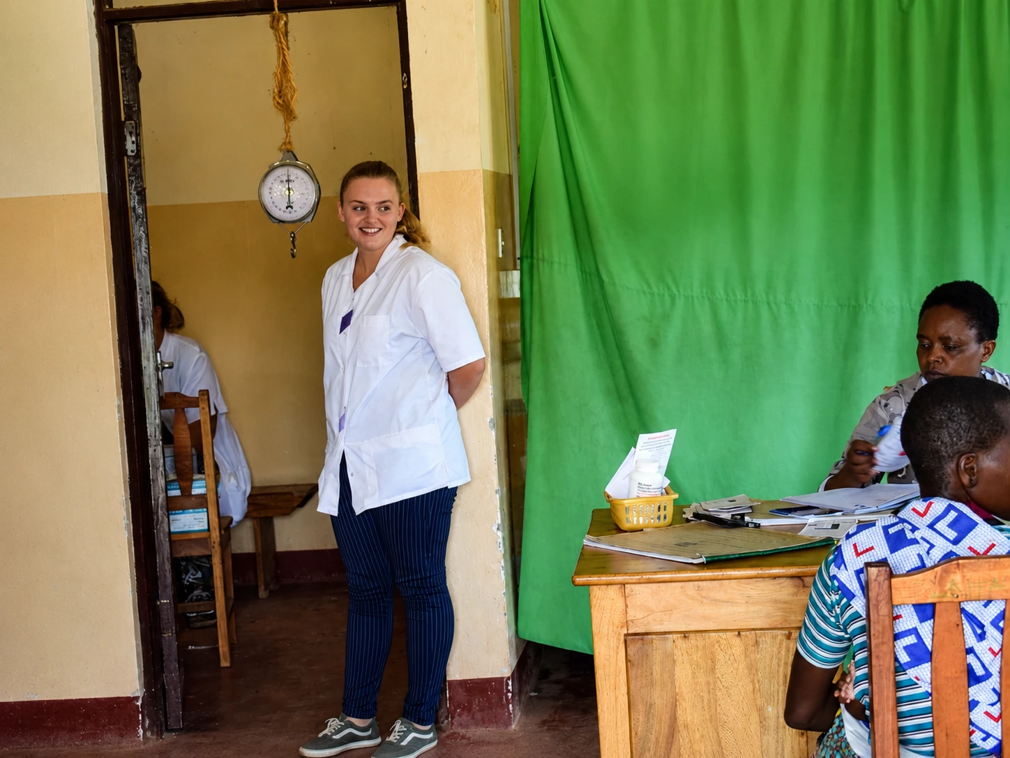 Midwifery elective participant learning from a local midwife in a maternity ward in Tanzania